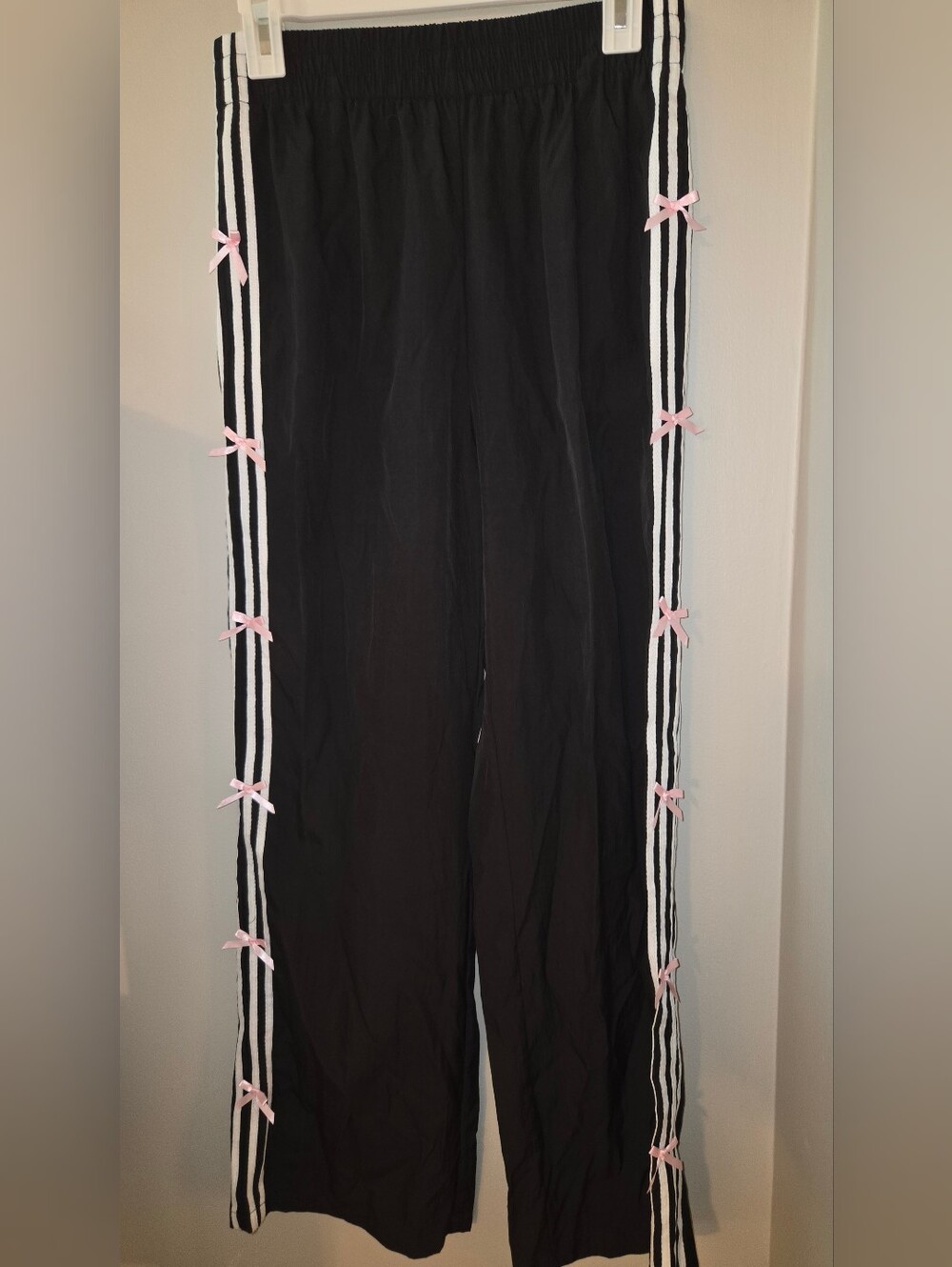 PacSun Black Joggers with White Stripes & Pink Bow Accents